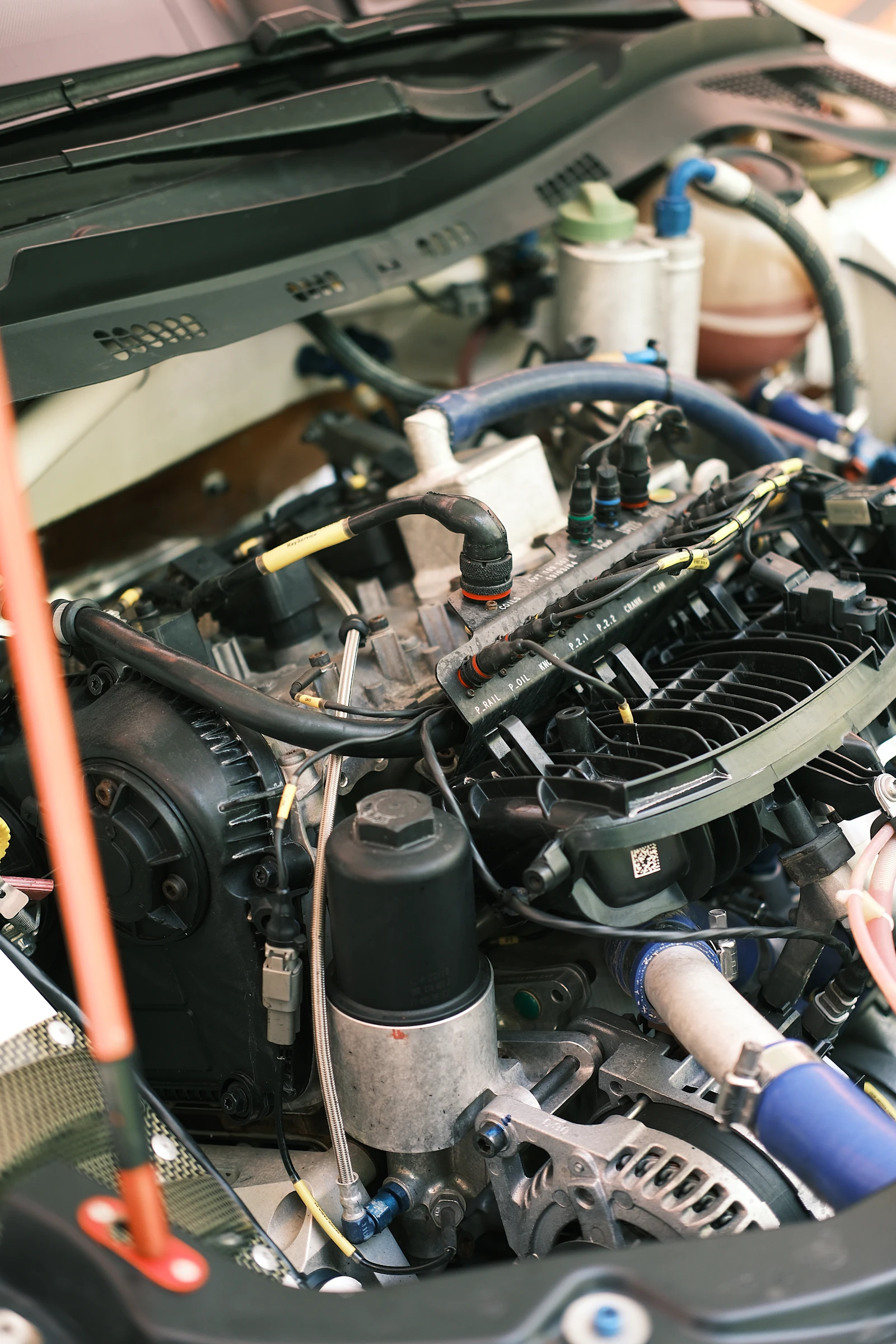 Car engine compartment with the hood open